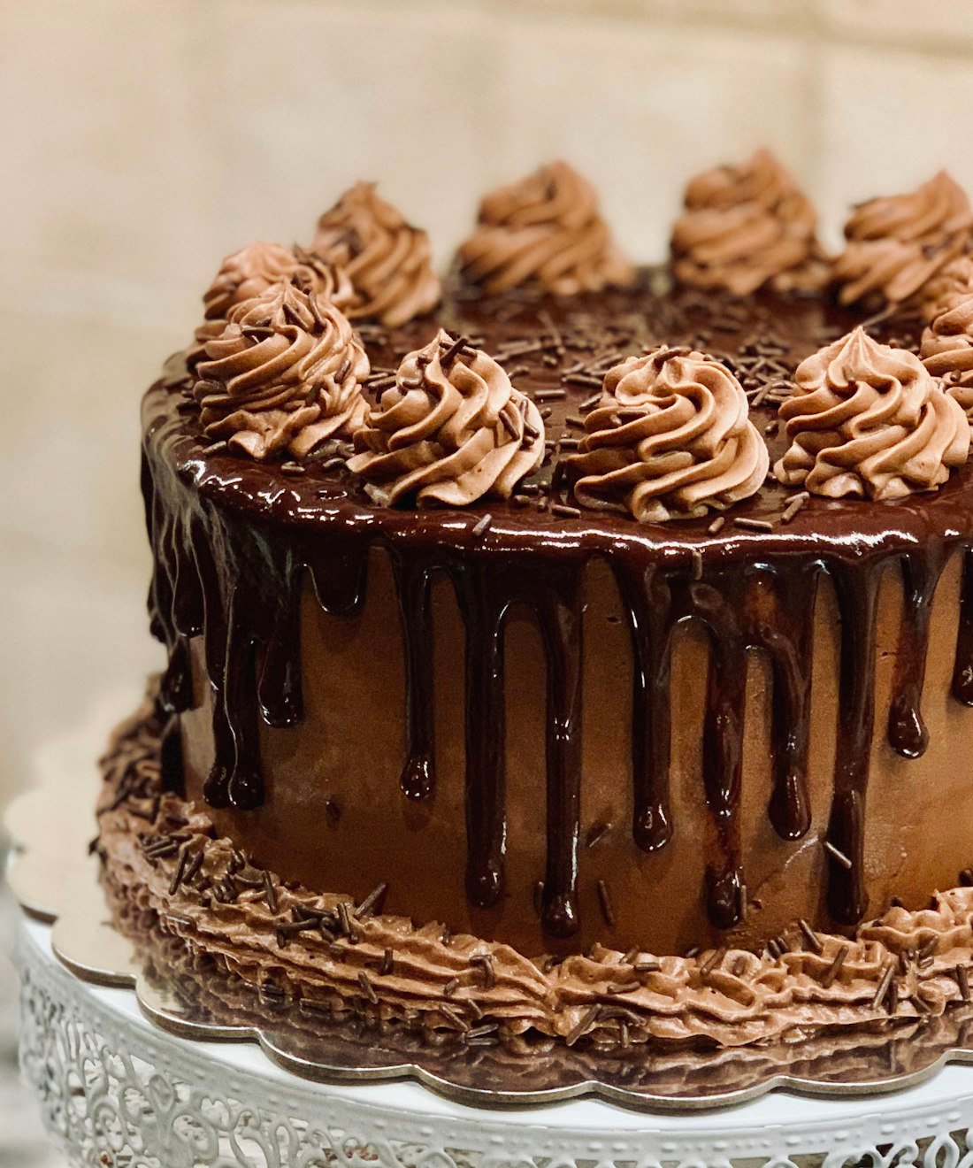 Decorative chocolate cake with rich frosting